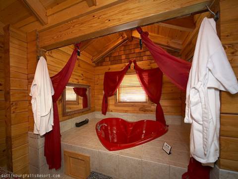 heart shaped tub in a cabin